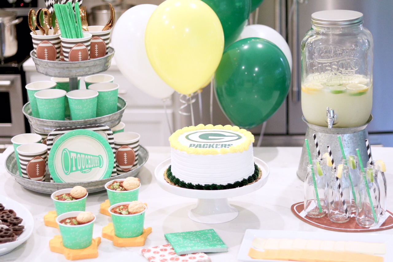 Football Sunday Party Ideas to Kickoff NFL Season - Green Bay Packers Football Party Ideas - Football Decor - DIY Tissue Paper Pom Poms - Pack a PUNCH Packers punch - Packers themed Party - Green Bay Packers Cake - Venison Chili Recipe #Packers #GreenBayPackers #NFL #cake #partytheme #footballparty